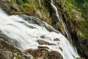 Beautiful waterfall in Norway. Norwegian nature landscape at summer.