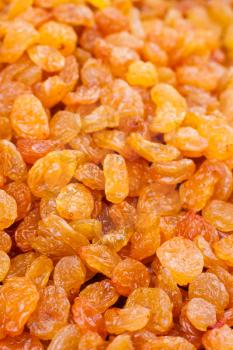 Tasty Golden Dried Raisins Heap On Local Market Background