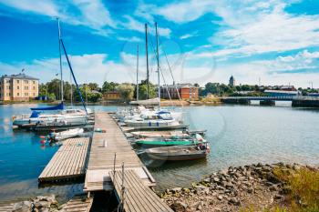Helsinki, Finland. Harbour And Quay Yacht Stand At Pier, Jetty In Summer Day