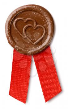 brown wax seal with hearts and ribbon isolated on white with clipping paths