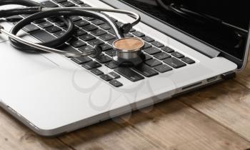 stethoscope on the keyboard of pc