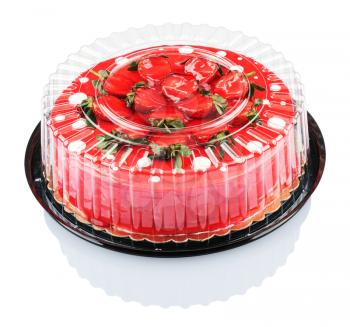 red cake with strawberries isolated on white background with clipping path