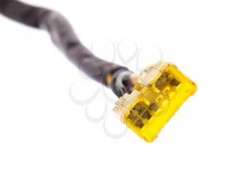 Yellow connection plug isolated on a white background
