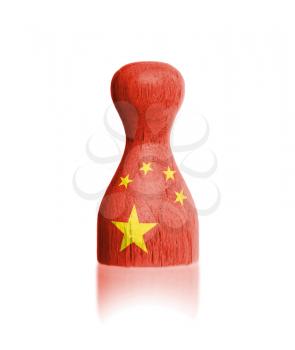 Wooden pawn with a painting of a flag, China