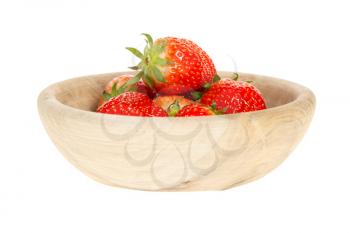 A few strawberries in a wooden bowl