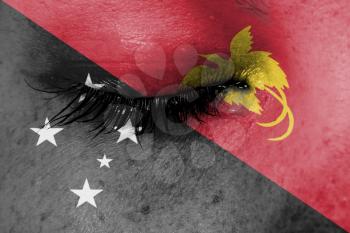 Crying woman, pain and grief concept, flag of Papua New Guinea