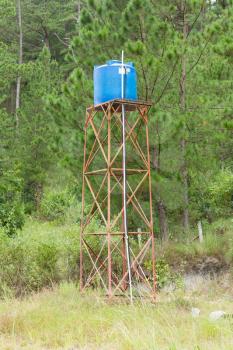 Primitive blue water tower in central Vietnam