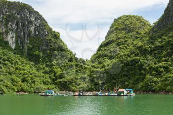 Floating fisherman's village in ha long bay, northern vietnam