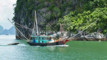 Fishing boat in the Ha Long Bay, Vietnam