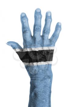 Hand of an old woman with arthritis, isolated on white, Botswana