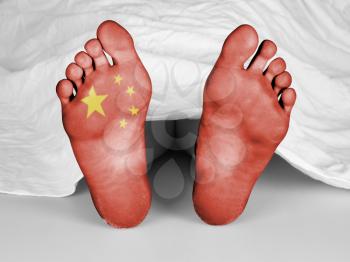 Dead body under a white sheet, flag of China