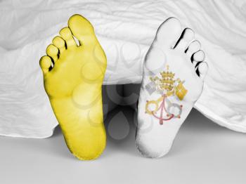 Dead body under a white sheet, flag of Vatican City