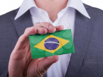 Businessman showing card, matte paper effect, Brazil