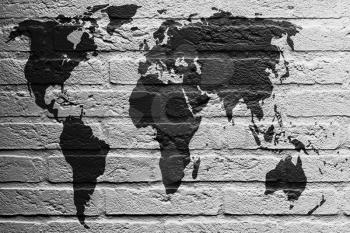 Brick wall with a painting of a flag isolated, World Map