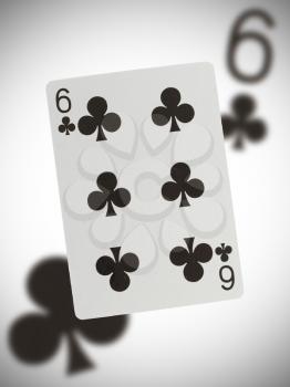 Playing card with a blurry background, six