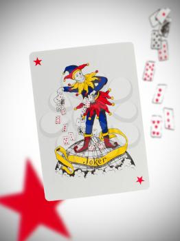 Playing card with a blurry background, joker