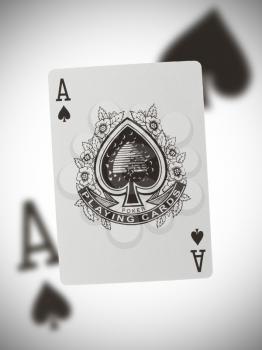 Playing card with a blurry background, ace of spades