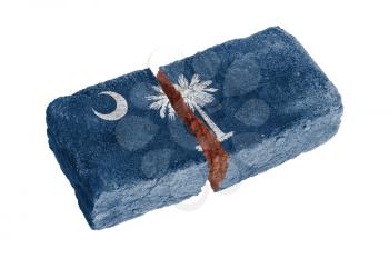 Rough broken brick, isolated on white background, flag of Carolina