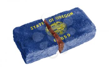 Rough broken brick, isolated on white background, flag of Oregon