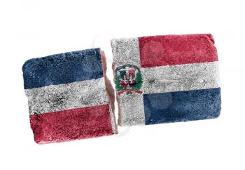 Rough broken brick, isolated on white background, flag of Dominican Republic