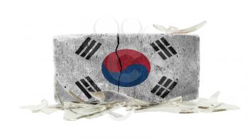 Brick with broken glass, violence concept, flag of South Korea