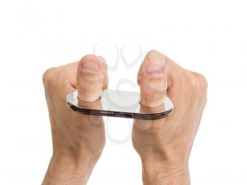 Adult hands in thumb cuffs isolated on a white background