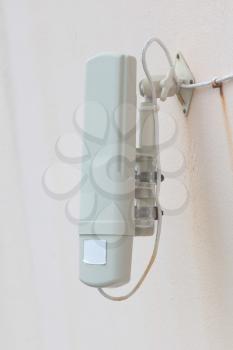 Small wifi transmitter hanging on a wall