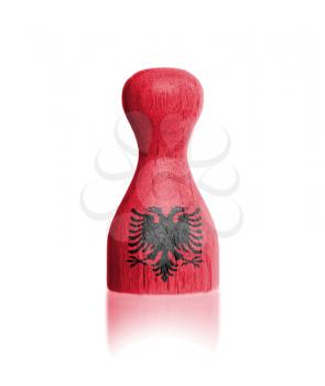 Wooden pawn with a painting of a flag, Albania