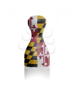 Wooden pawn with a painting of a flag, Maryland