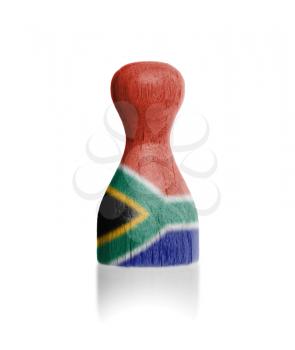 Wooden pawn with a painting of a flag, South Africa