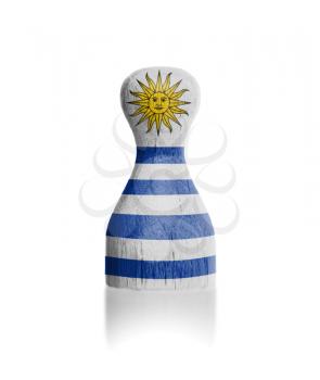 Wooden pawn with a painting of a flag, Uruguay