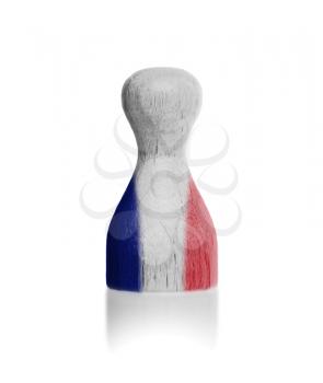 Wooden pawn with a painting of a flag, France