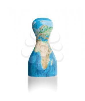 Wooden pawn with a painting of a map, earth