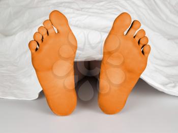 Body under a white sheet, suicide, sleeping, murder or natural death, orange feet