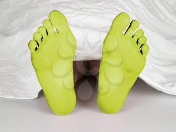 Body under a white sheet, suicide, sleeping, murder or natural death, yellow feet