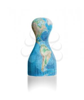 Wooden pawn with a painting of a map, earth