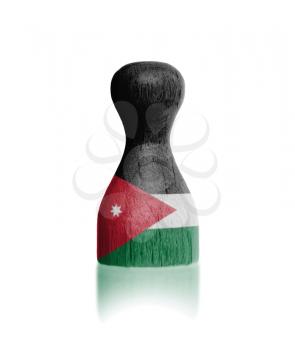 Wooden pawn with a painting of a flag, Jordan