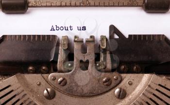 Vintage inscription made by old typewriter, about us