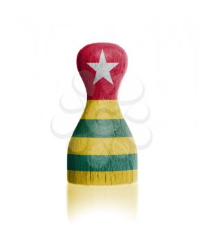 Wooden pawn with a painting of a flag, Togo