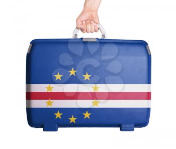 Used plastic suitcase with stains and scratches, printed with flag, Cape Verde