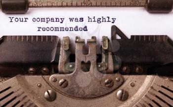 Vintage inscription made by old typewriter, your company was highly recommended