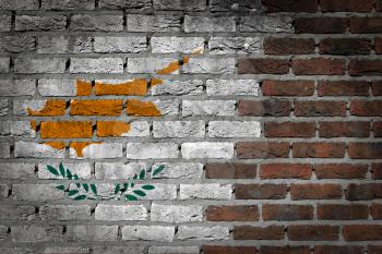 Very old dark red brick wall texture with flag - Cyprus