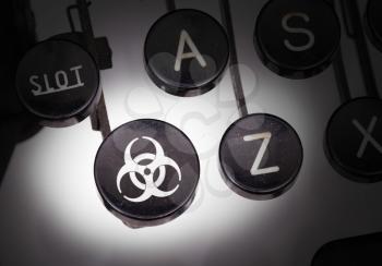 Typewriter with special buttons, biohazard