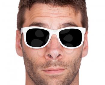 Close-up of a man wearing white sunglasses, isolated on white