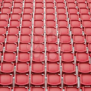 Red seat in sport stadium, empty seats ready for the public