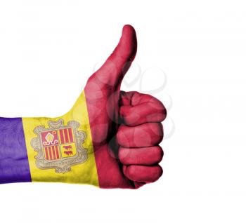 Closeup of male hand showing thumbs up sign against white background, Andorra