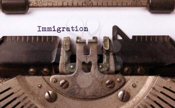 Vintage inscription made by old typewriter, immigration