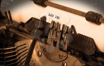 Close-up of an old typewriter with paper, selective focus, Log in