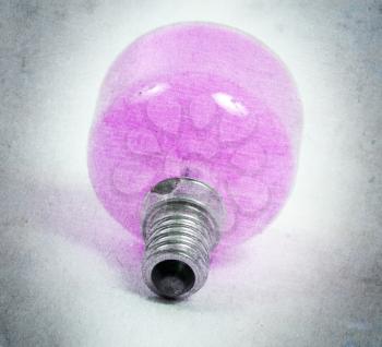 Old pink lightbulb isolated on a white background - Vintage look
