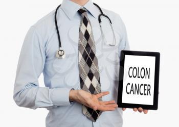 Doctor, isolated on white backgroun,  holding digital tablet - Colon cancer